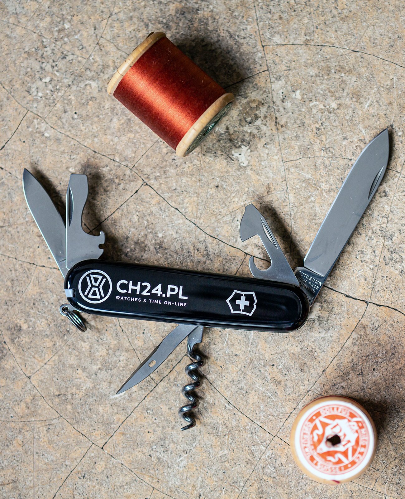 Swiss Army Knife by Victorinox with cogwheels and CH24 printing 